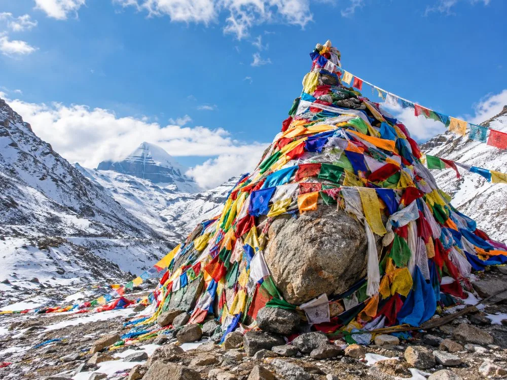 Prayer flags covering the top of the Dolma La pass